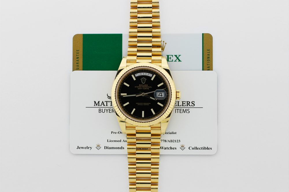 Rolex 18k Yellow Gold Black Motif 40MM Day-Date 228238 with Box & Card