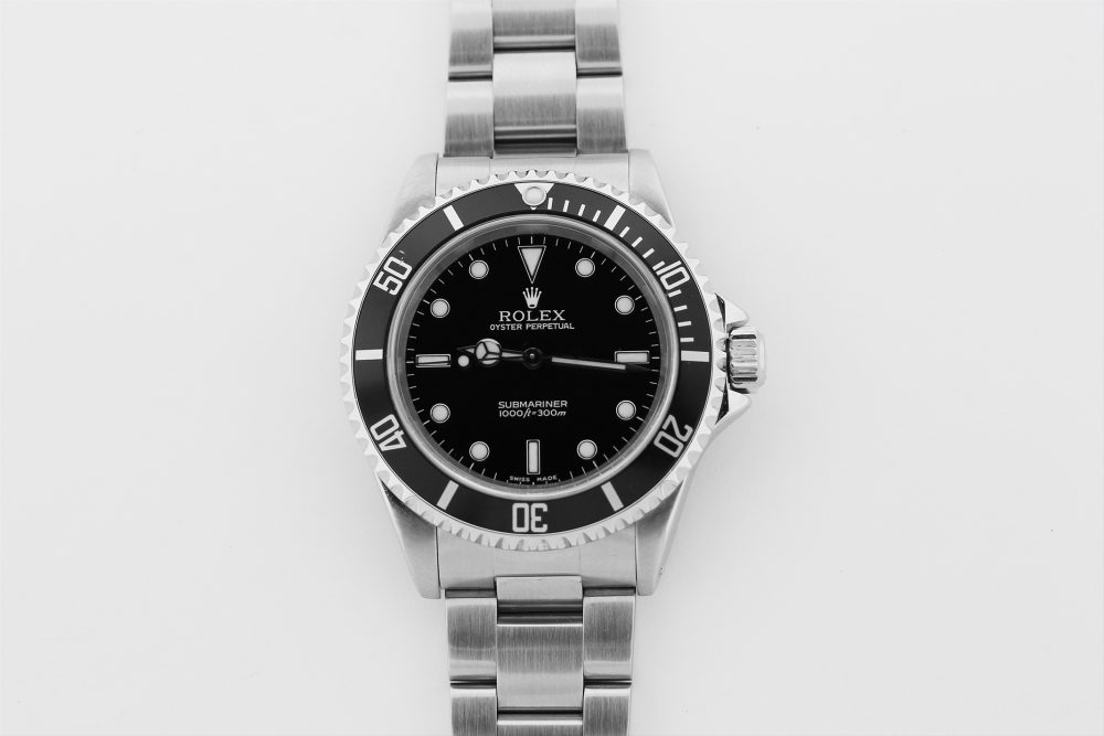 Rolex Steel Submariner 14060 with Box & Paper