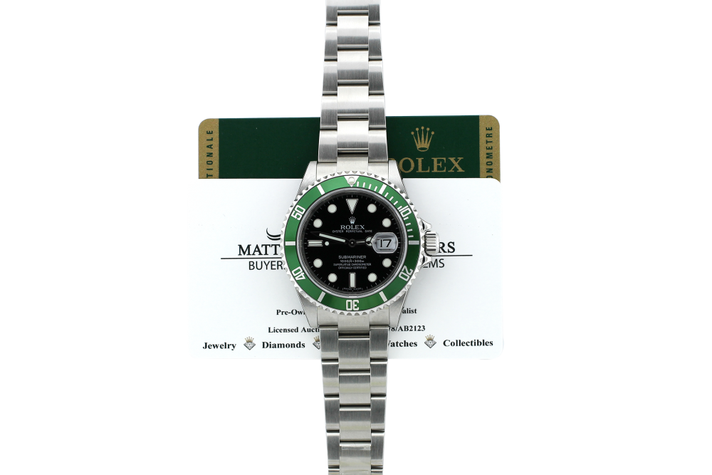 Rolex Steel Green Anniversary Submariner 16610T with Box & Booklets (Factory Case Stickers)