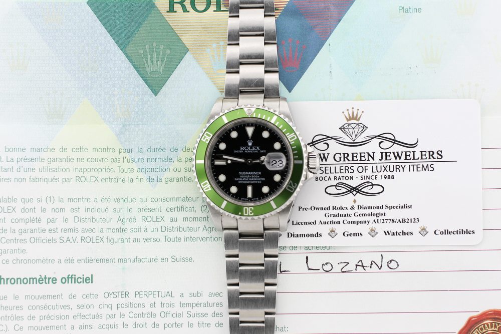 Rolex Steel Anniversary Submariner "Flat 4" 16610T with Box & Paper